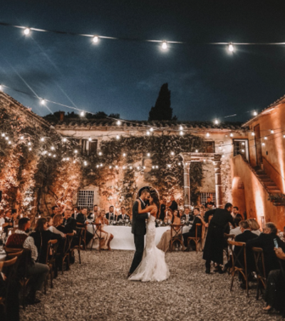 couple's first dance at outdoor wedding reception