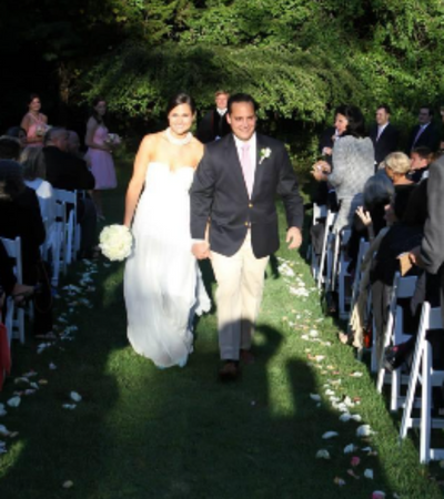 bride and groom walking down aisle after ceremony