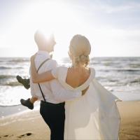 bride and groom on beach