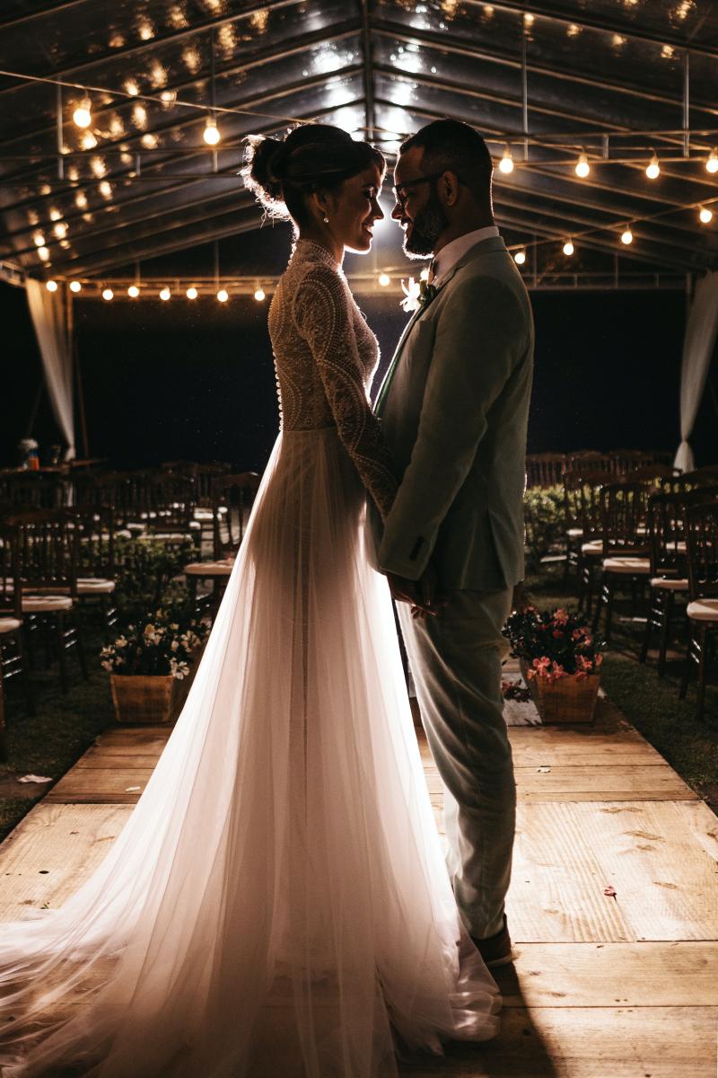 bride and groom embracing